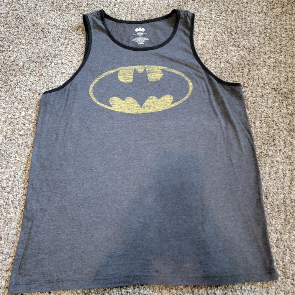2 Mens XL muscle shirts.